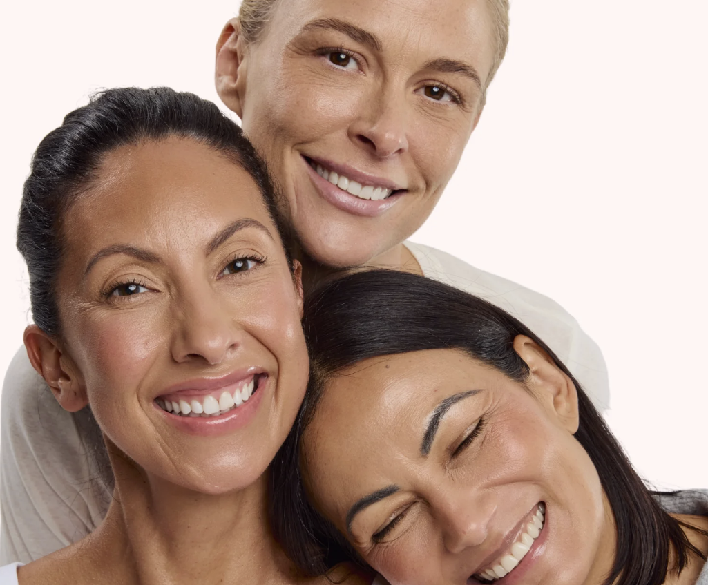 Three women of different ages with healthy, natural-looking skin